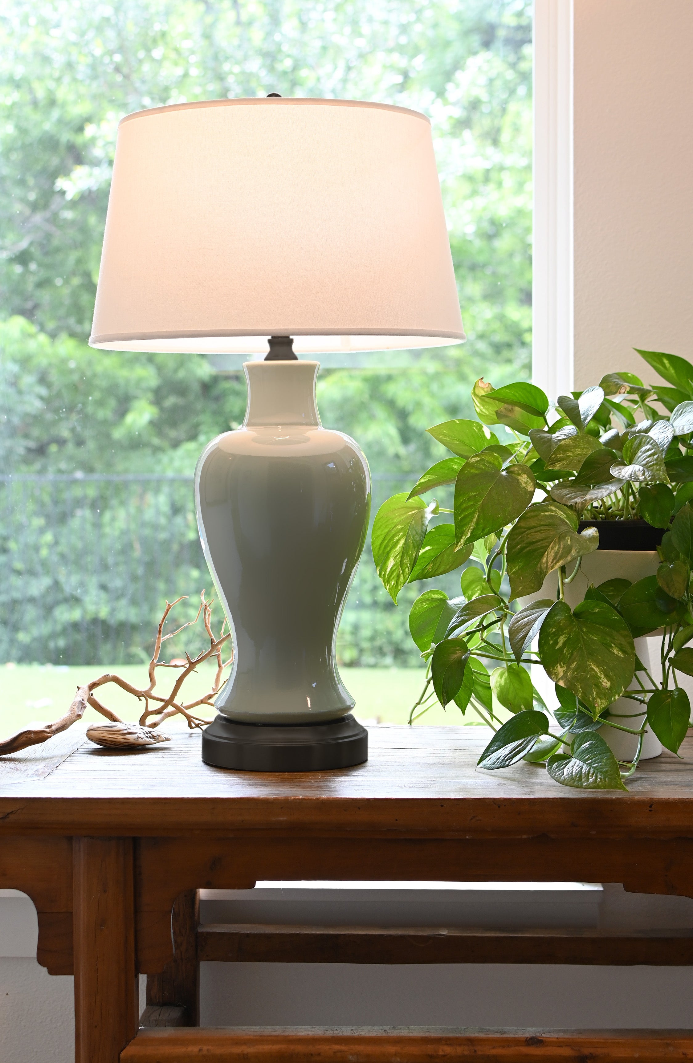 light green glaze on black full sized cordless battery lamp