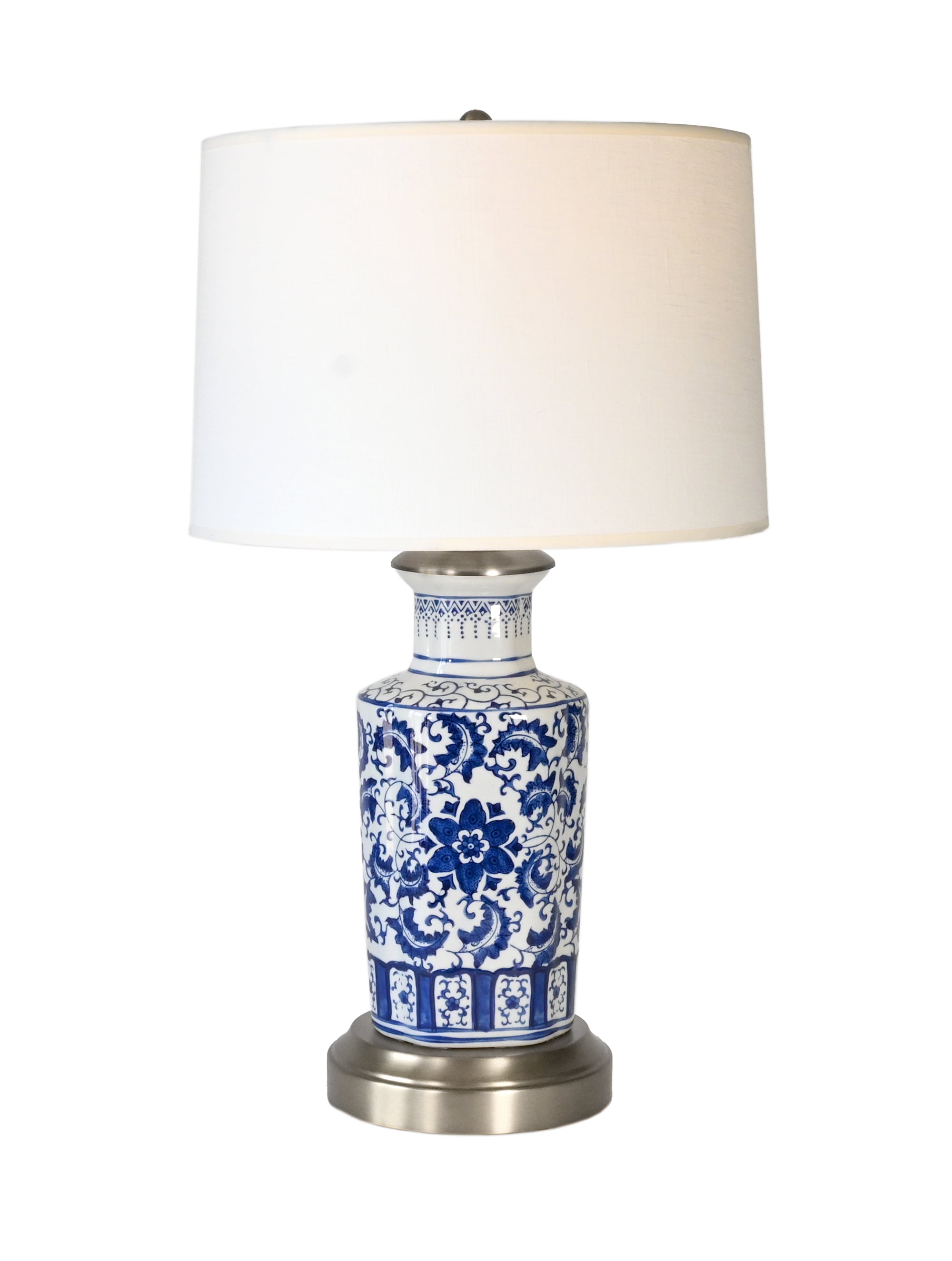 blue and white porcelain cordless lamp on nickel metal