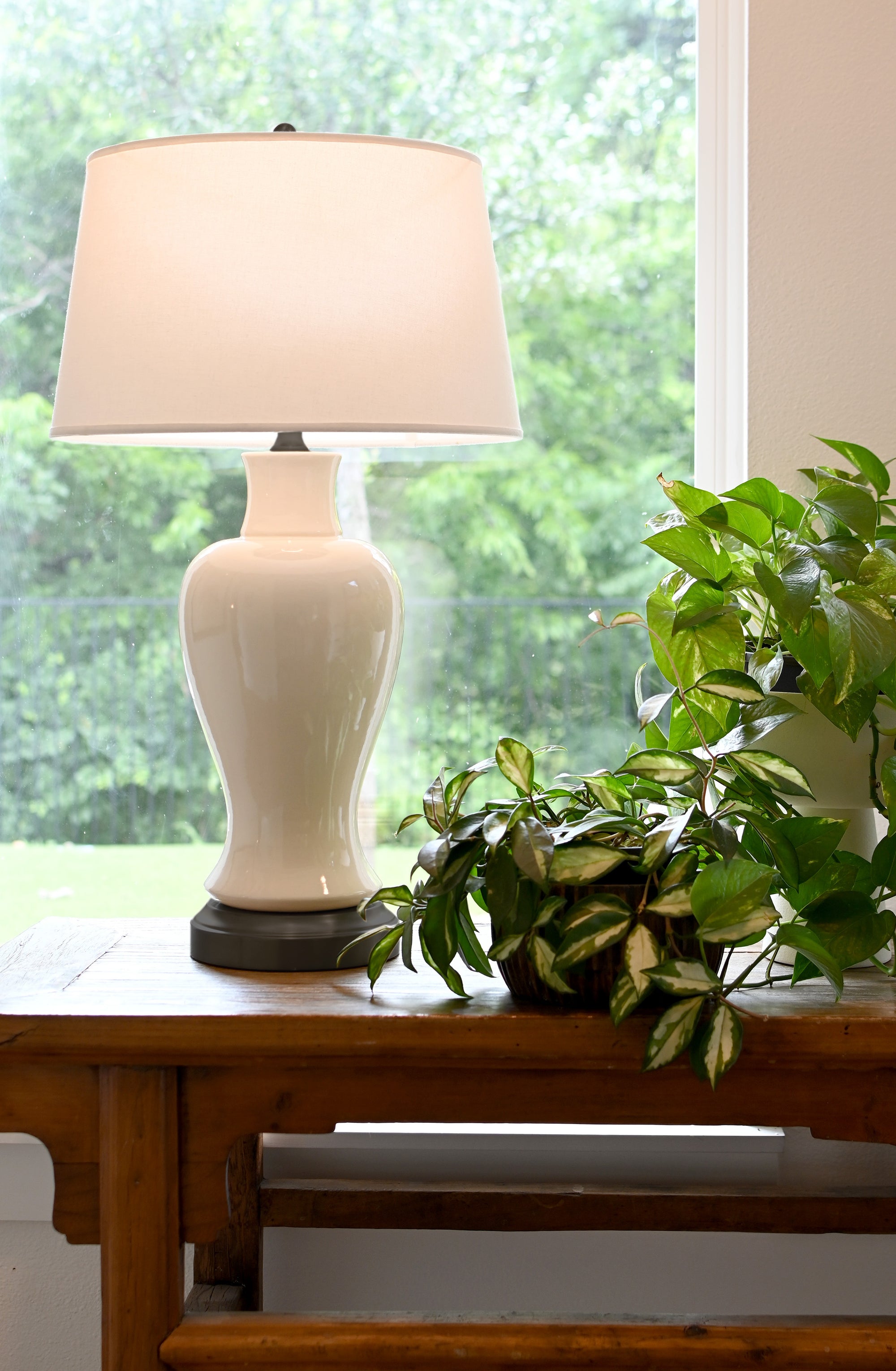 white ceramic lamp with black battery base full sized