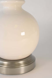 close up of ivory ceramic made in the usa by modern lantern on nickel