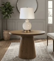 Wooden side table with abbeygale cordless lamp in a entry room setting