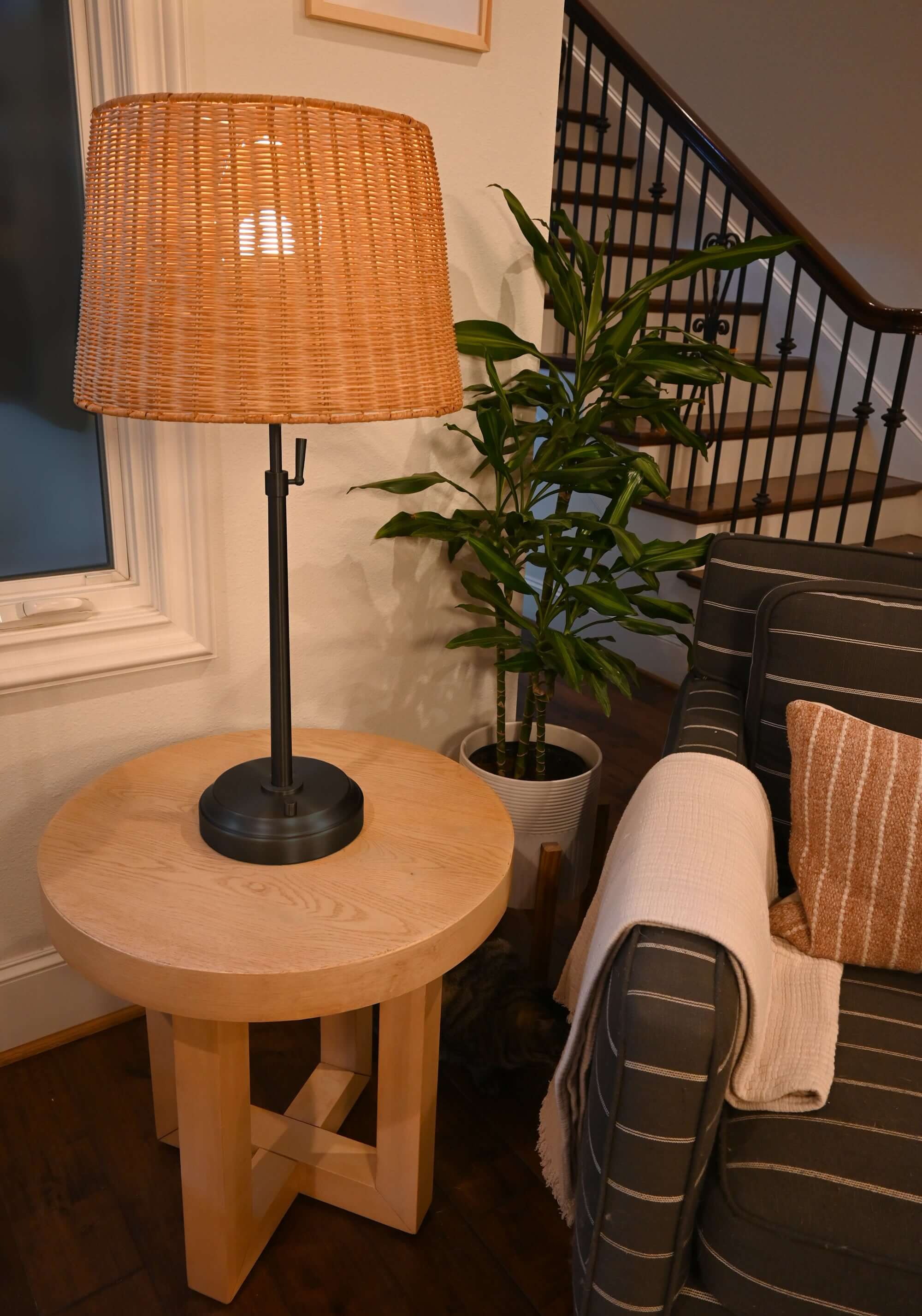 alexis black metal cordless lamp with rattan shade