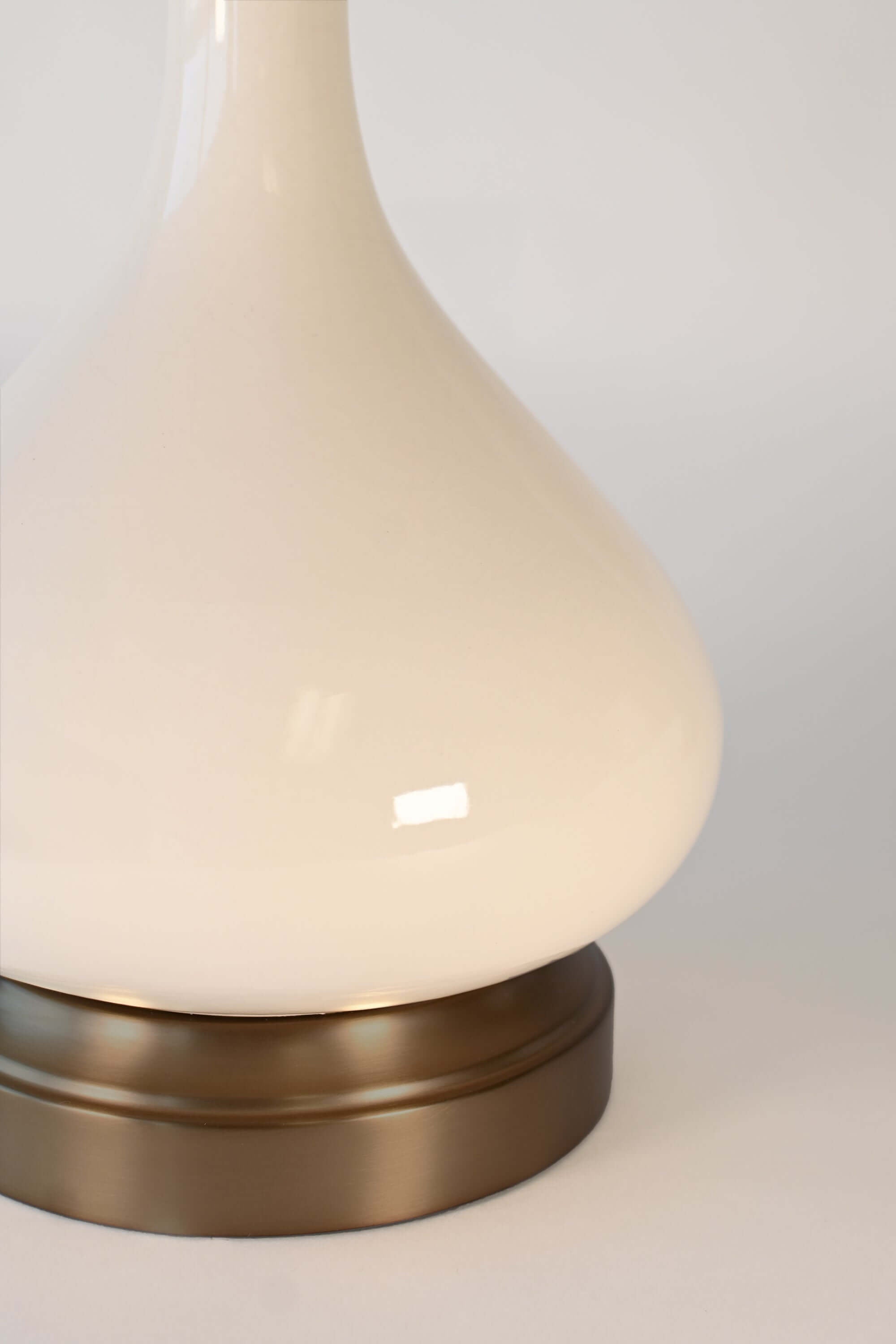 detail of bartlett ivory on dark brass