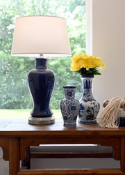 navy cordless ceramic lamp on nickel by modern lantern