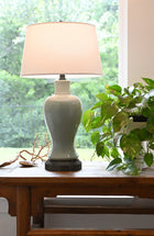 light green glaze on black full sized cordless battery lamp