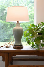 celadon ceramic on dark brass metal cordless table lamp usa made