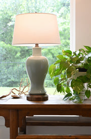 celadon ceramic on dark brass metal cordless table lamp usa made