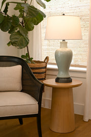 light celadon ceramic battery operated lamp on black metal base