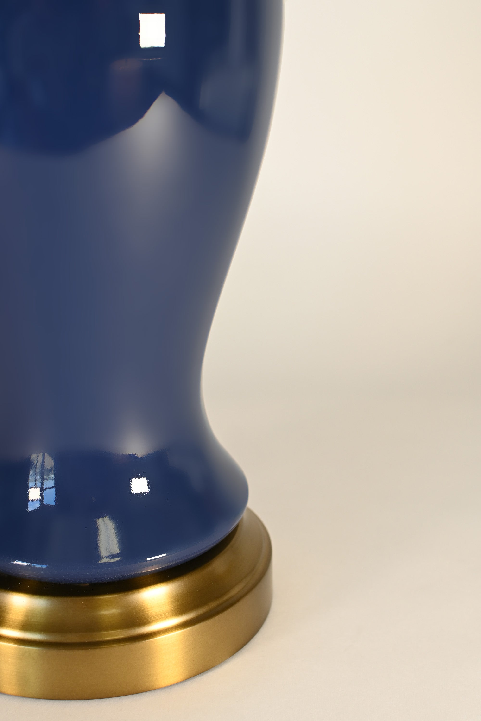 navy ceramic lamp on brass base detail