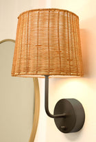 emily black metal cordless wall lamp with rattan