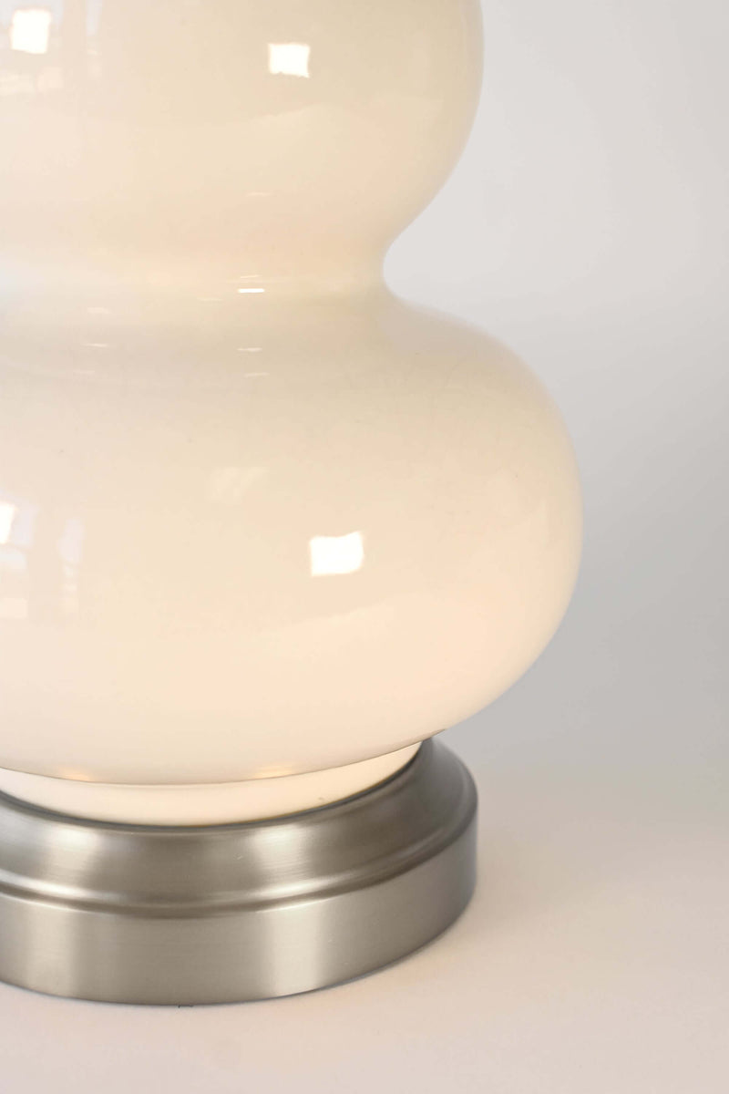 ivory ceramic detail on brushed nickel base