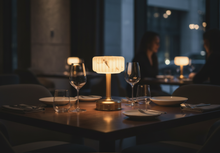 Dining table setting with a rechargeable  modern lantern Milo lamp and wine glas