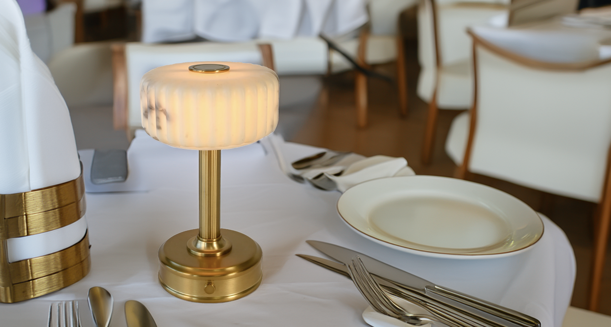 Decorative cordless table lamp on a set dining table restaurant lighting