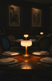 restaurant setting with milo brass cordless lamp