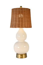 norma cordless small lamp with rattan shade on brass hardware