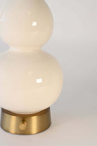 detail of our ivory cordless lamp ceramic body on brass base