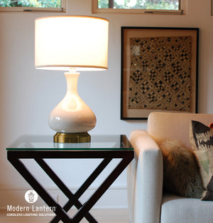 bartlett ivory glaze on brass cordless table lamp by modern lantern